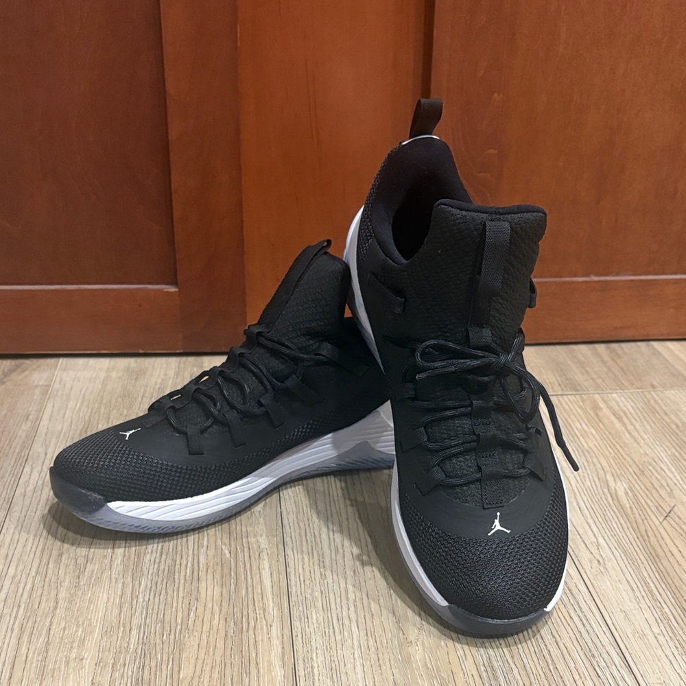 Jordan Black Athletic Shoes with White Soles
